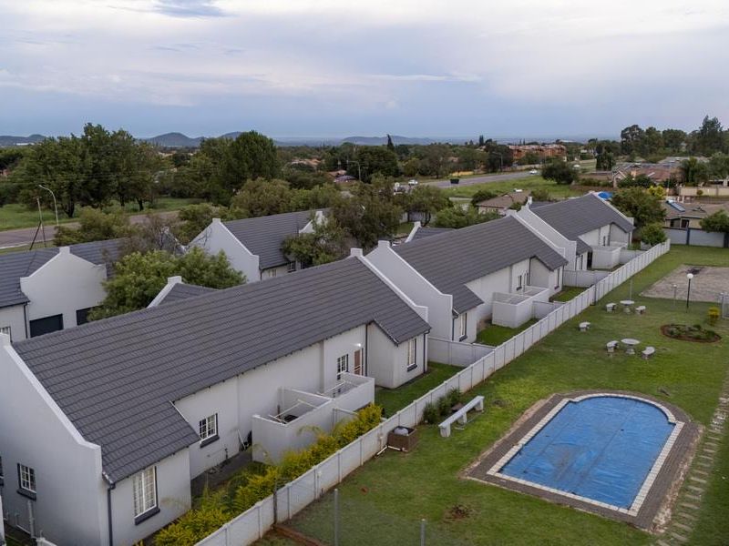 SECURE LIVING WITH POTENTIAL: 2-BEDROOM HOME WITH CHARM - Photo 2