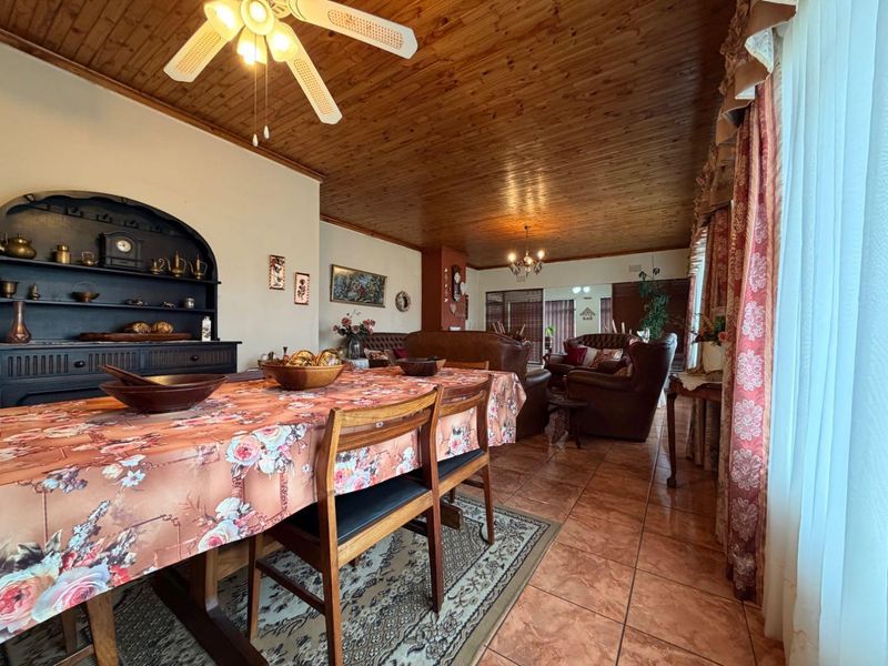 Some homes don't need to shout to be noticed—they simply welcome you in. - Photo 10