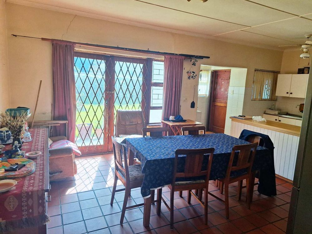 Dining room with doors to back garden
