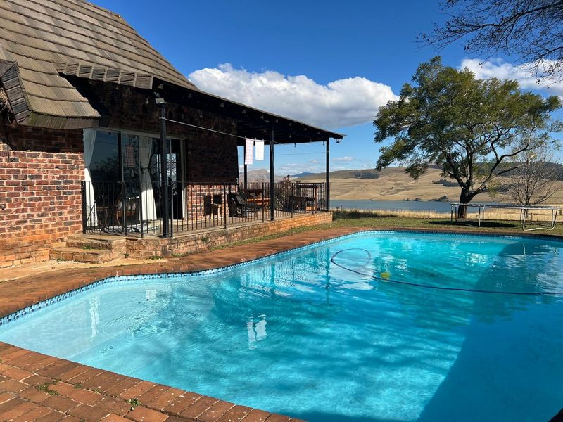 Spacious Country Home with Workshop and Spectacular Midmar Dam Views in Tweedie - Photo 4
