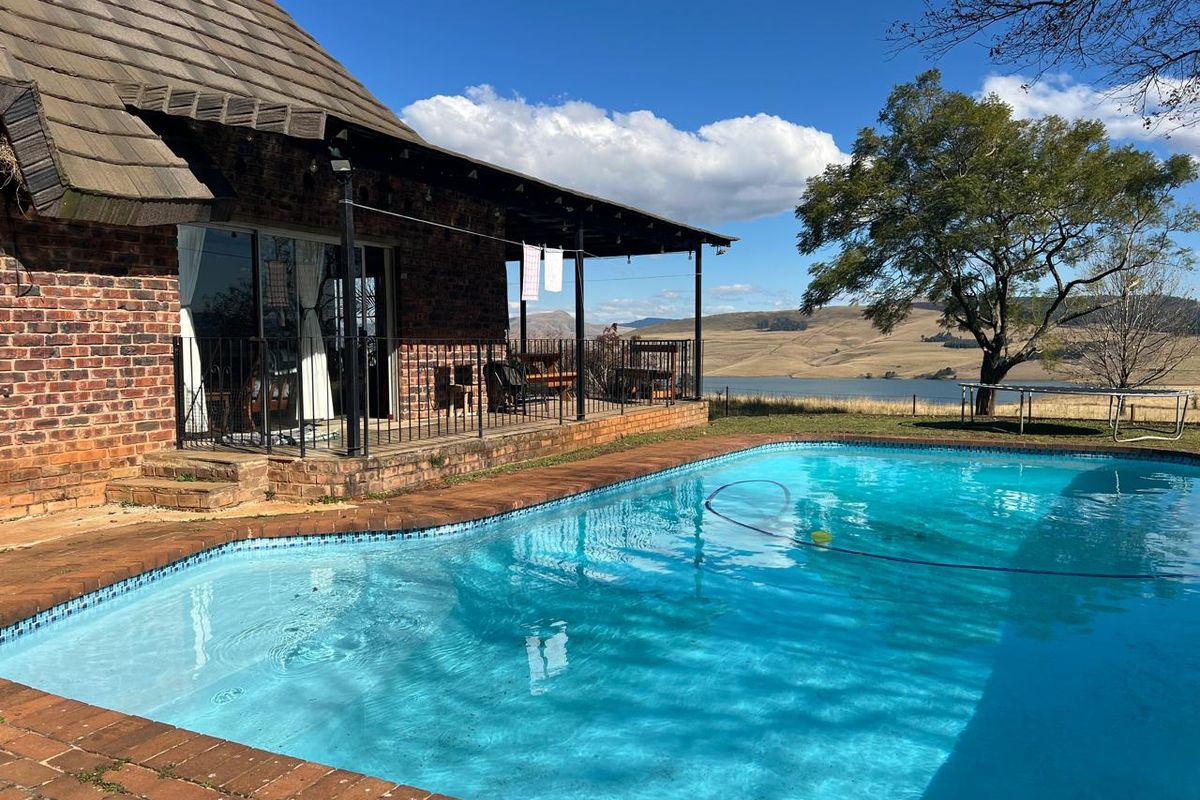 Spacious Country Home with Workshop and Spectacular Midmar Dam Views in Tweedie - Photo 4