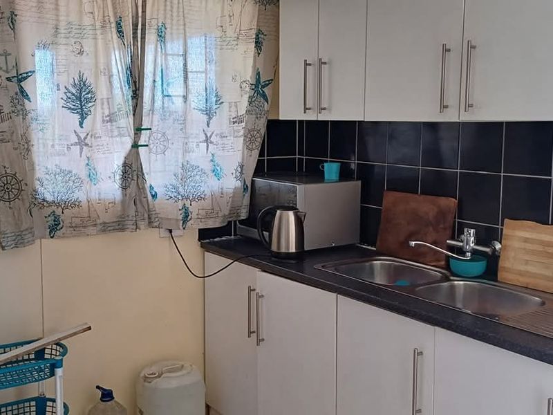 House is situated behind the Okahandja Mall. Additional to the main house is a 4 bedroom flat. - Photo 6