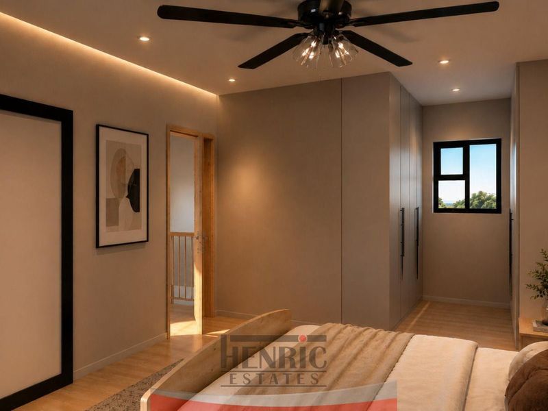 Modern bedroom featuring built-in cupboards, recessed and cove lighting, a ceiling fan, and timber flooring.