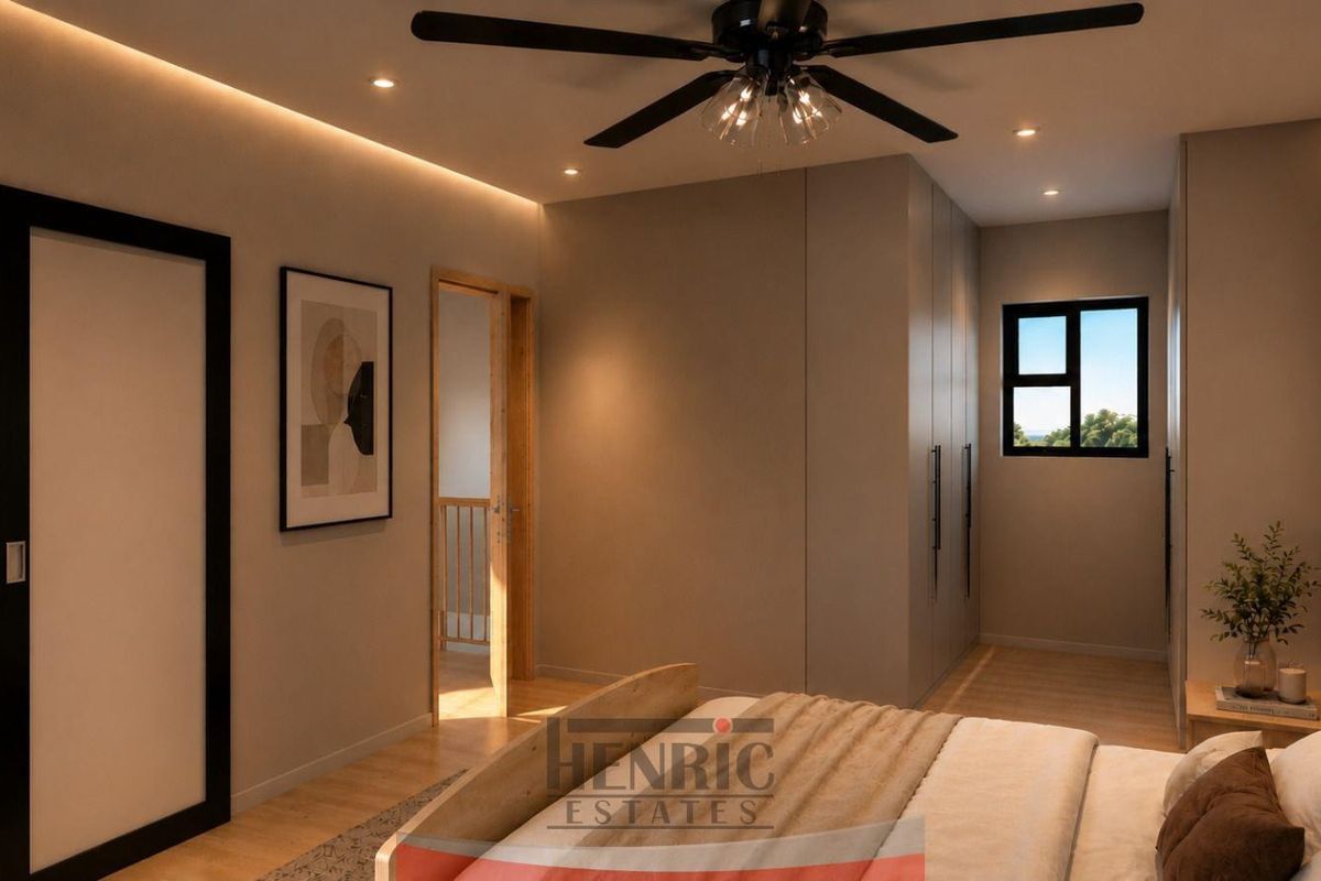 Modern bedroom featuring built-in cupboards, recessed and cove lighting, a ceiling fan, and timber flooring.