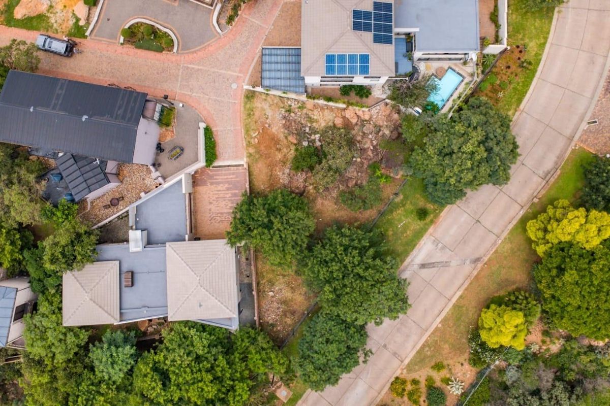 Nestled in a sought-after estate in Pretoria East, this exceptional 431 sqm parcel of land offers a rare opportunity to build your dream home in a setting of timeless beauty. With sweeping, breathtaking views, this is the closest you’ll come to the e - Photo 4