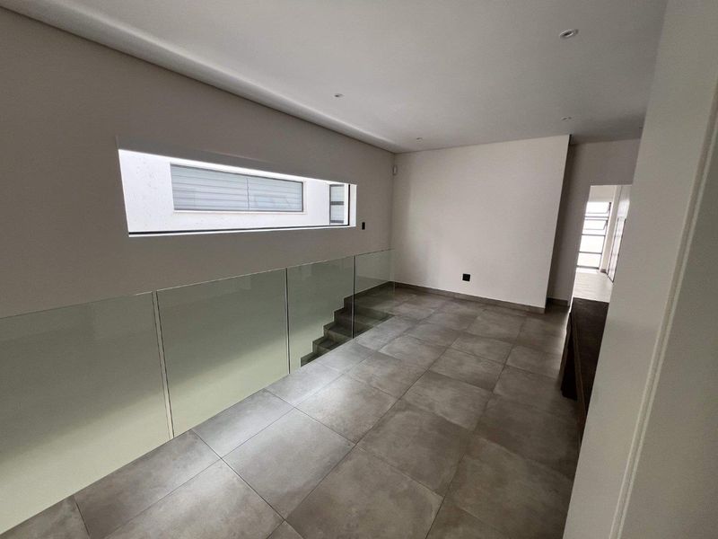 Modern 4-Bedroom Townhouse in Hyde Park | Luxury Living in a Prime Sandton - Photo 9