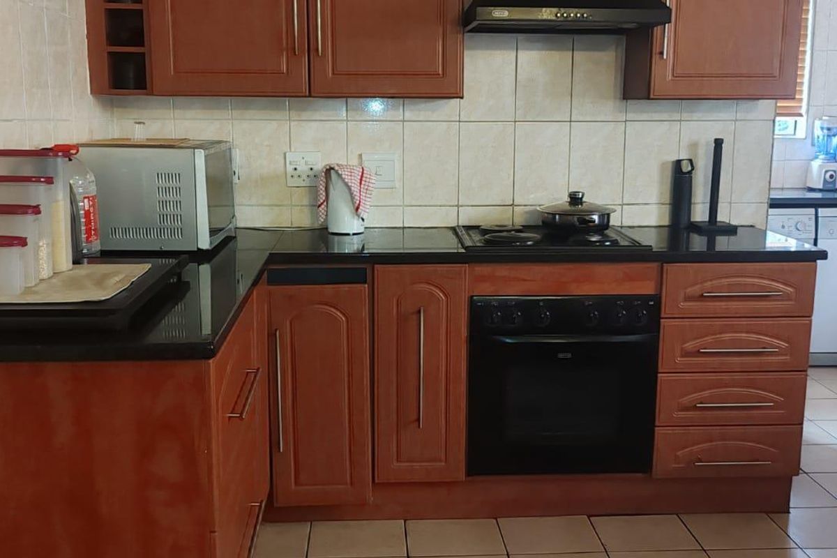 Midrand's Finest: Modern Comfort in a Serene Setting - Photo 3