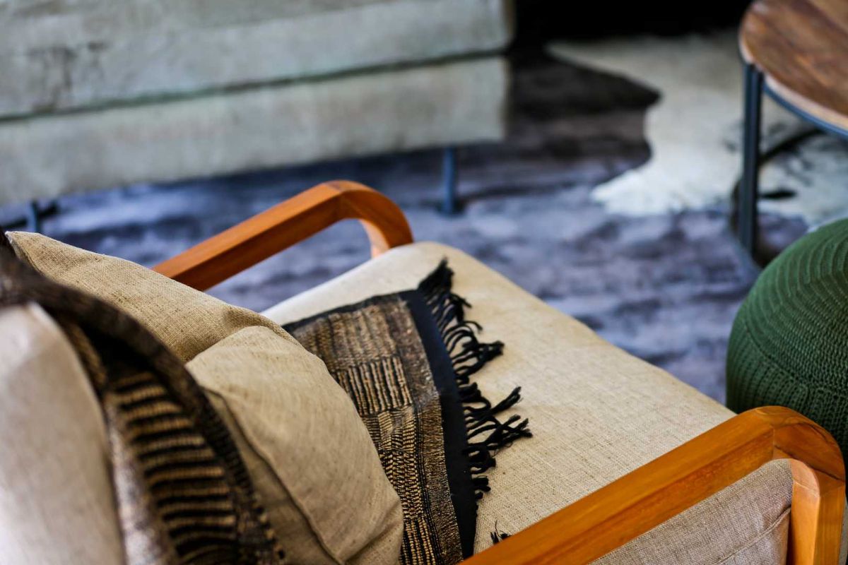 A close-up view of a living area featuring modern flooring and contemporary interior styling.