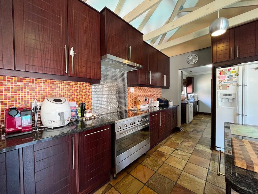Kitchen with gas stove.