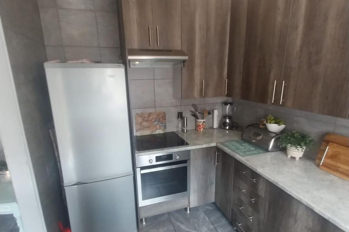 Modern Living Awaits: 2-Bedroom, Balcony, and a Lush Garden! - Photo 2