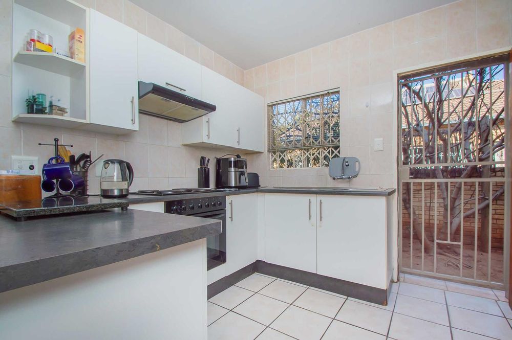 Well planned kitchen with ample cupboards