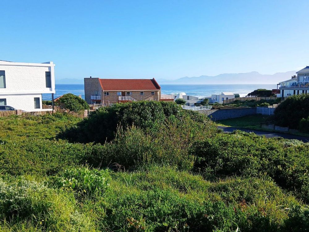 Sea View from our Plot (in Perlemoenbaai). Hermanus coastline at the back.