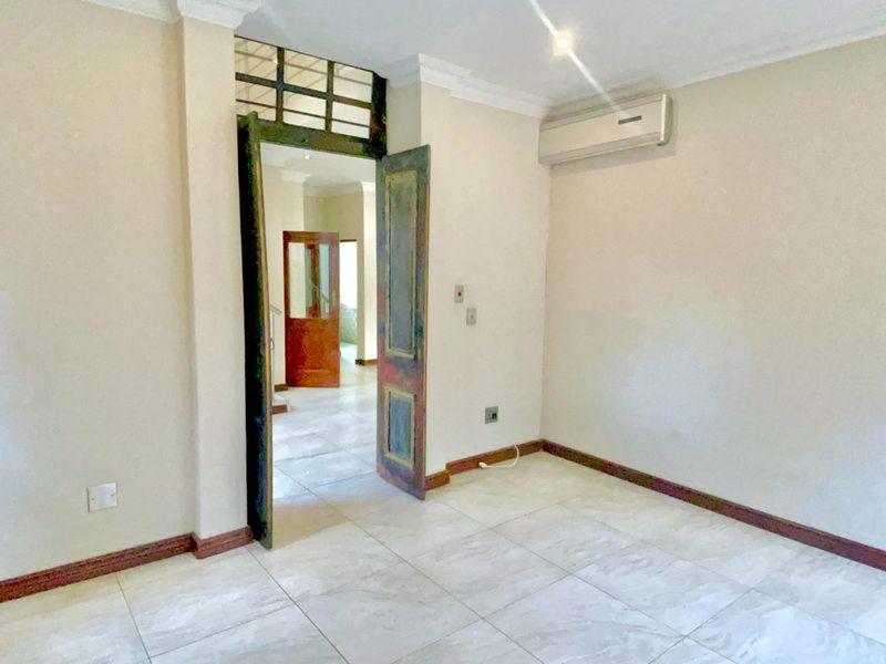 **4-Bedroom Family Home with a Pool in Willow Acres Estate, Pretoria East** - Photo 8