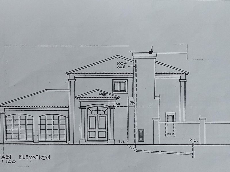 Architectural east elevation drawing for a residential property, detailing the facade, garage, and chimney structure.