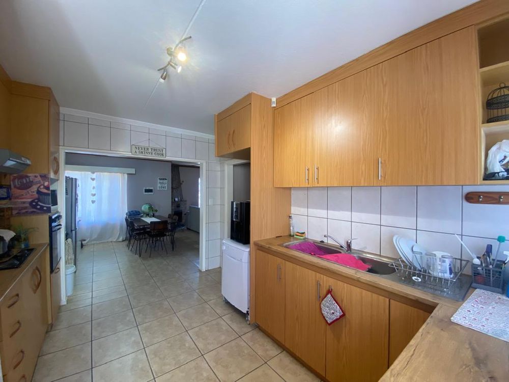 Kitchen and dining area. Built-in cupboards