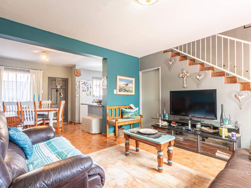 **Charming Duplex with Modern Comforts in Pristine Condition** - Photo 6