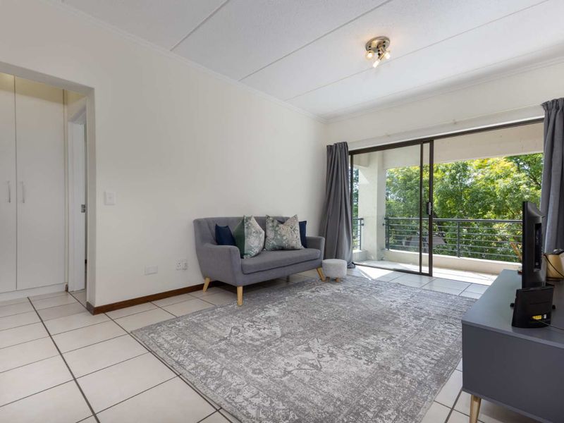 A WELL- POSITIONED MIDDLE FLOOR UNIT IN SOUGHT AFTER TEQUILA SUNRISE - Photo 6