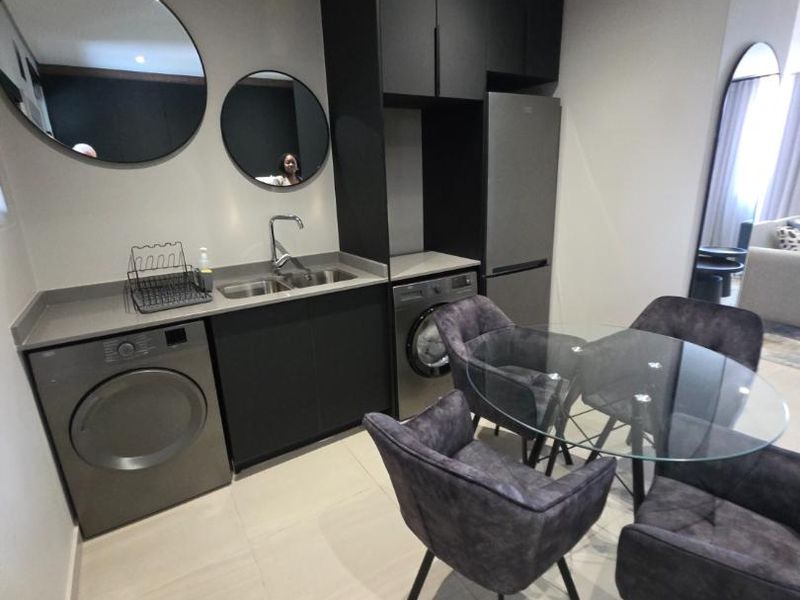 INCREDIBLE FULLY FURNISHED ULTRA MODERN STUDIO APARTMRNT IN SANDTON - Photo 10