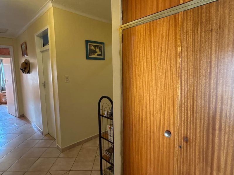 Set high above street level on a massive erf with a large front garden and elevated views - Photo 10