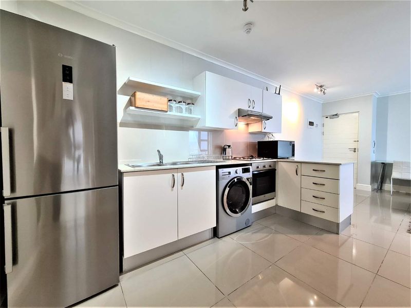 Modern & Secure 2 Bedroom Apartment - Photo 4