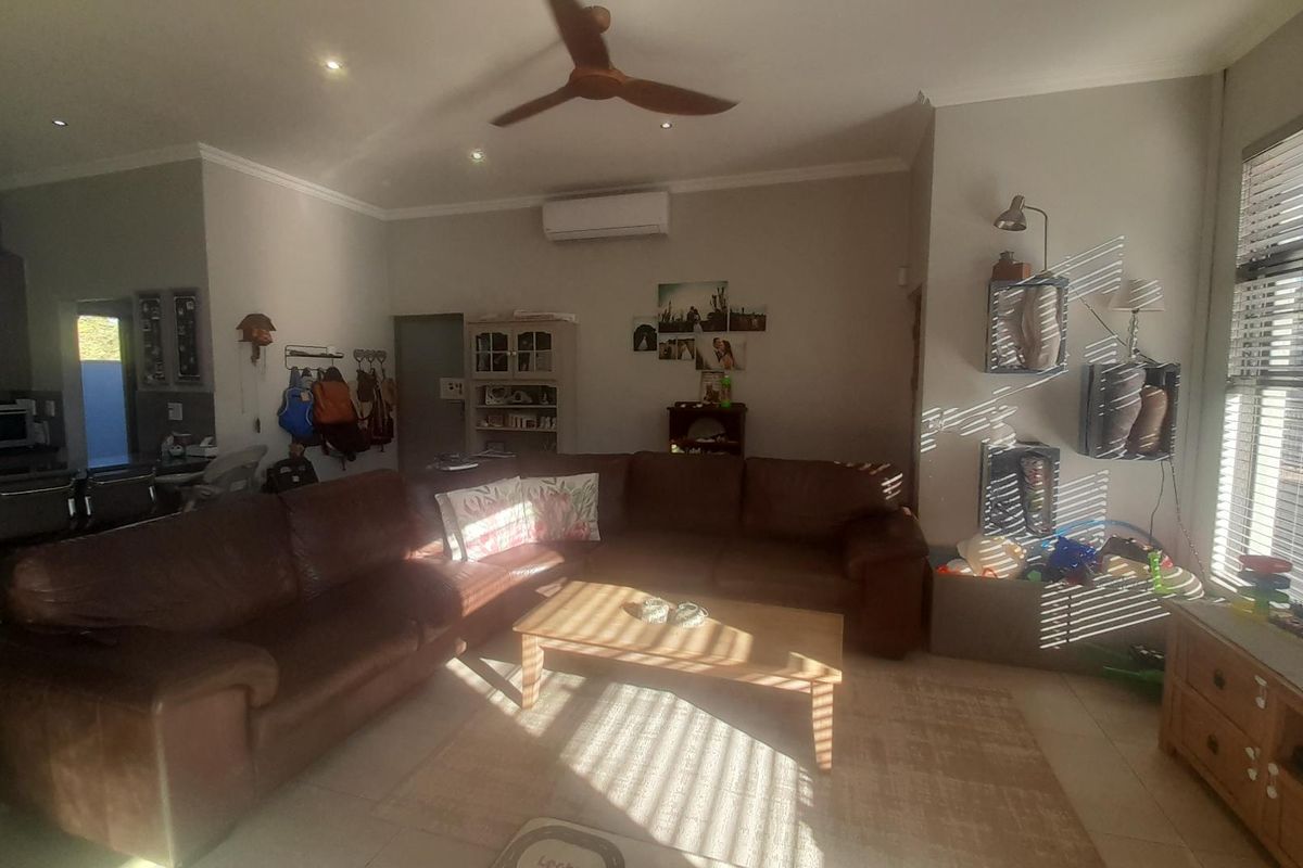 Entertain in Style: Open-Plan Living & Dedicated Braai Room - Photo 5