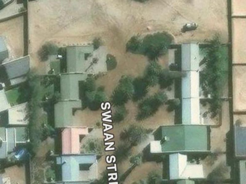 Aerial view of a vacant residential plot located on Swaan Street, showing the surrounding neighborhood and property boundaries.
