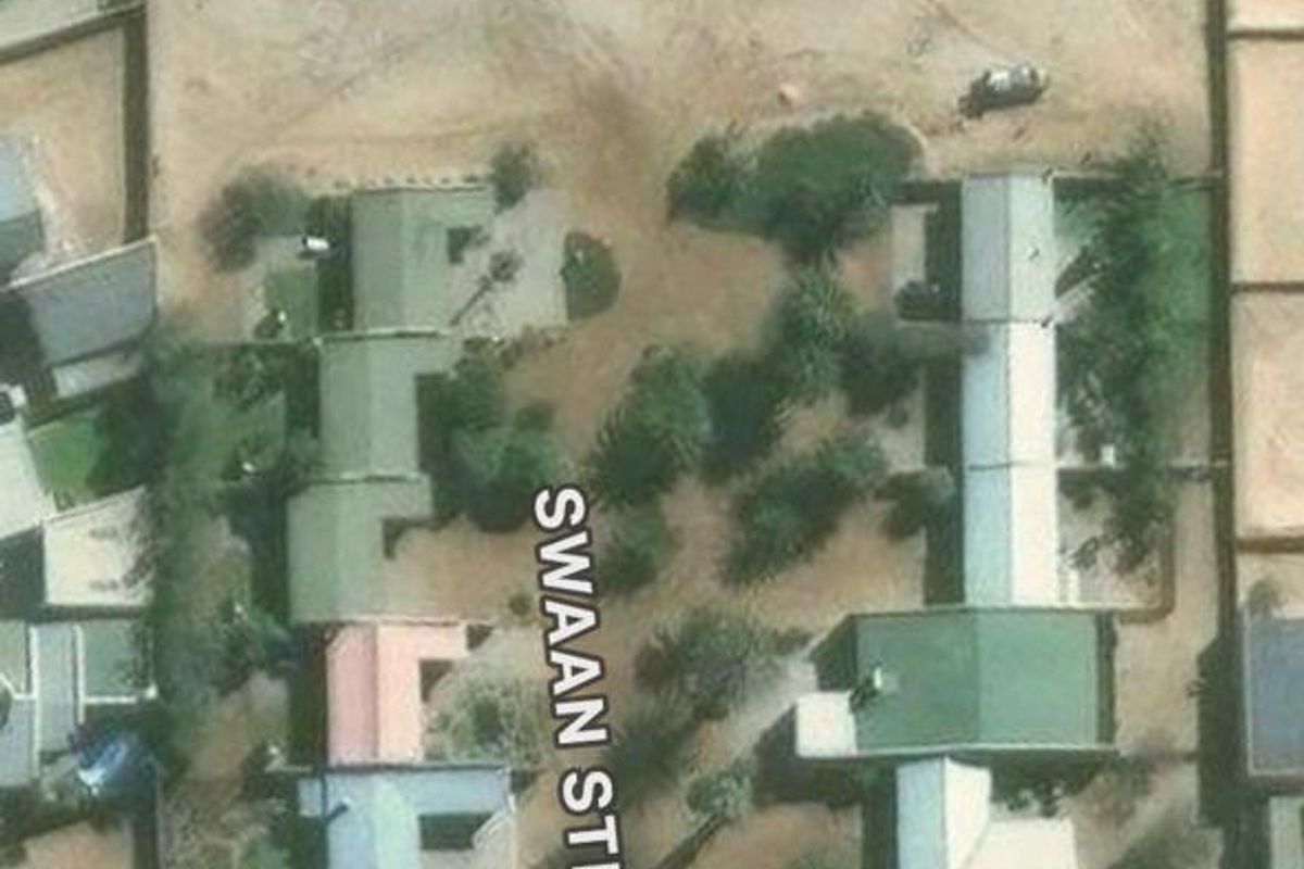 Aerial view of a vacant residential plot located on Swaan Street, showing the surrounding neighborhood and property boundaries.