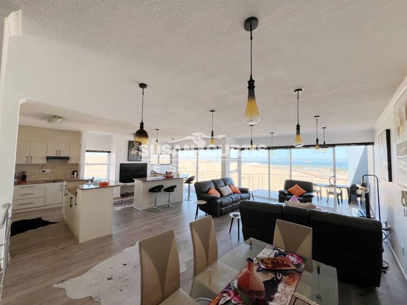 Live by the Sea: Modern Penthouse with Ample Living Space - Photo 8