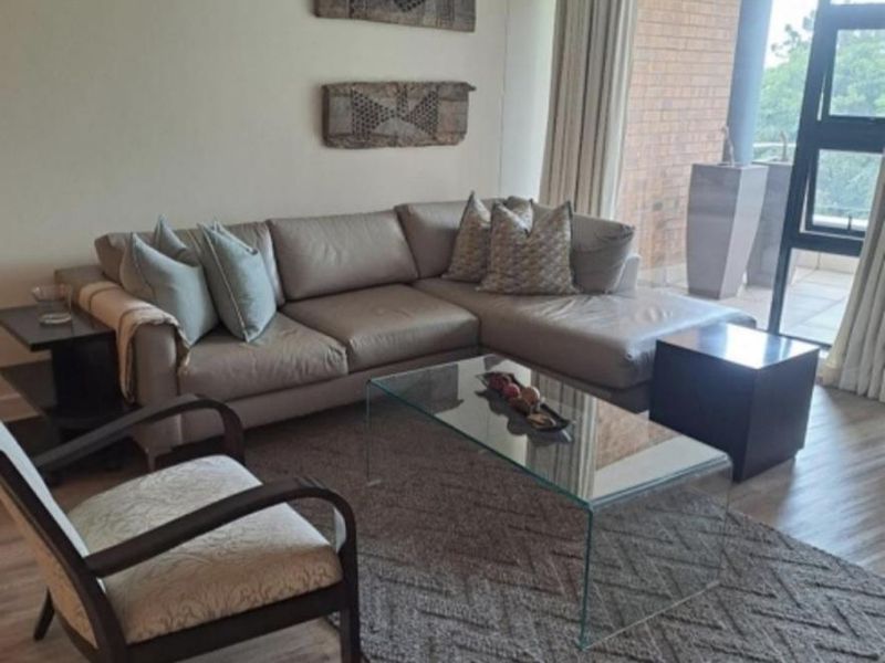 A BEAUTIFULLY FURNISHED TWO BEDROOM APARTMENT - Photo 1