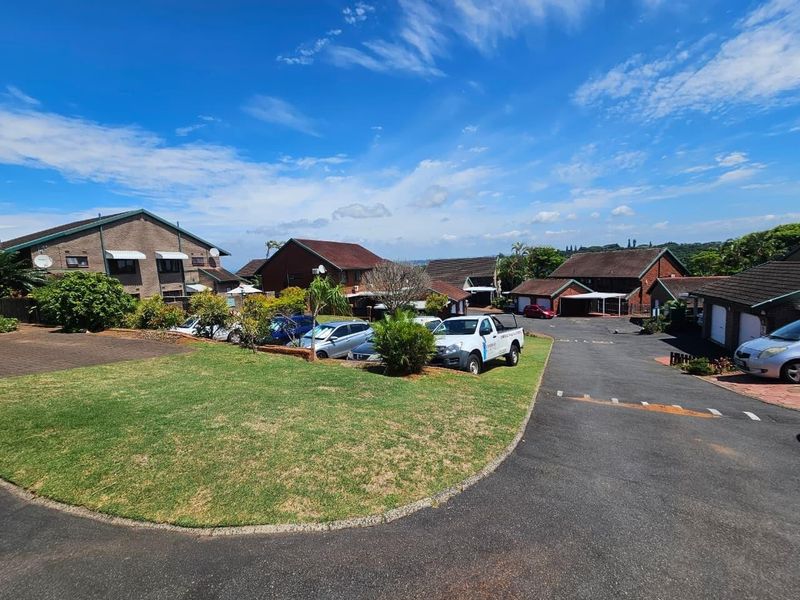 Welcome to Kinsley Gardens - where modern living meets relaxed coastal charm in the heart of the Bluff - Photo 1