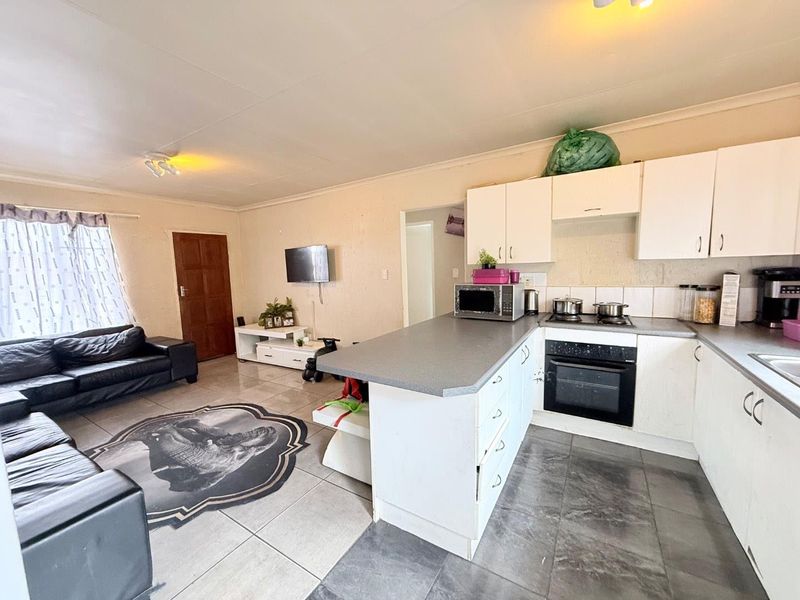 Your New Home: A Blend of Style, Comfort, & Accessibility! - Photo 3