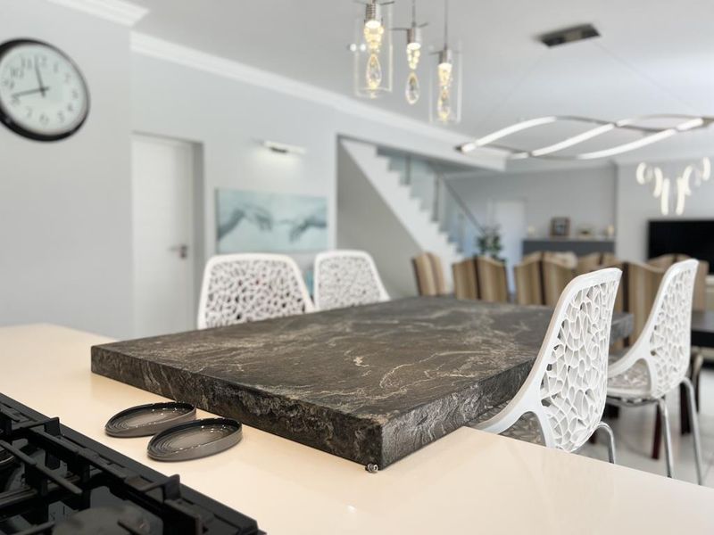 Hilltop Haven | Modern Multi-Level Marvel with Solar Power, Blueline Kitchen & Entertainer’s Garden - Photo 10