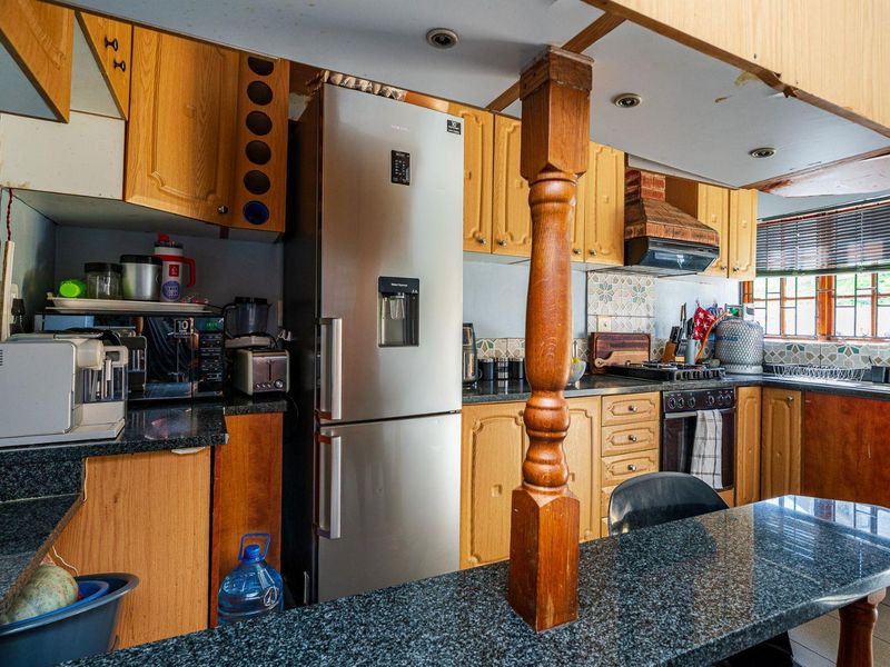Spacious Hillside Townhouse with Scenic Views & Great Potential - Photo 8