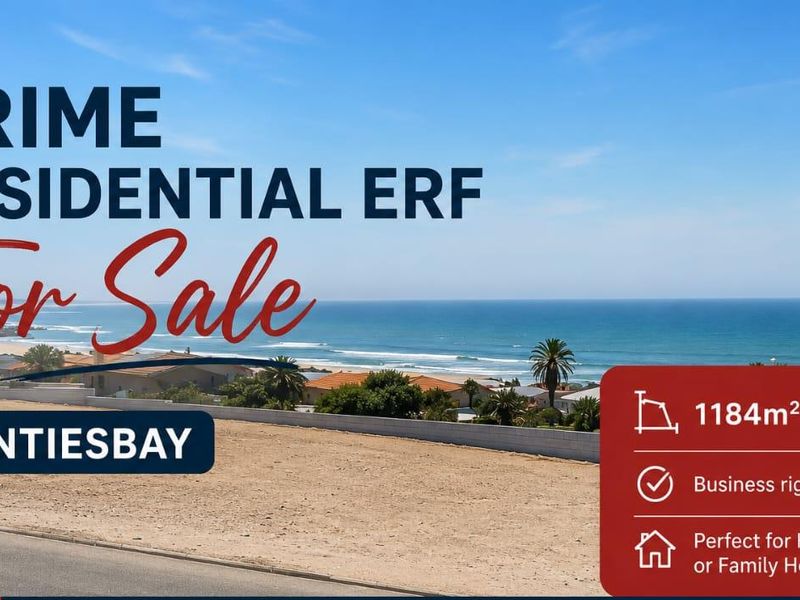 A vacant residential erf in Hentiesbay featuring ocean views and a boundary wall, suitable for a holiday or family home development.