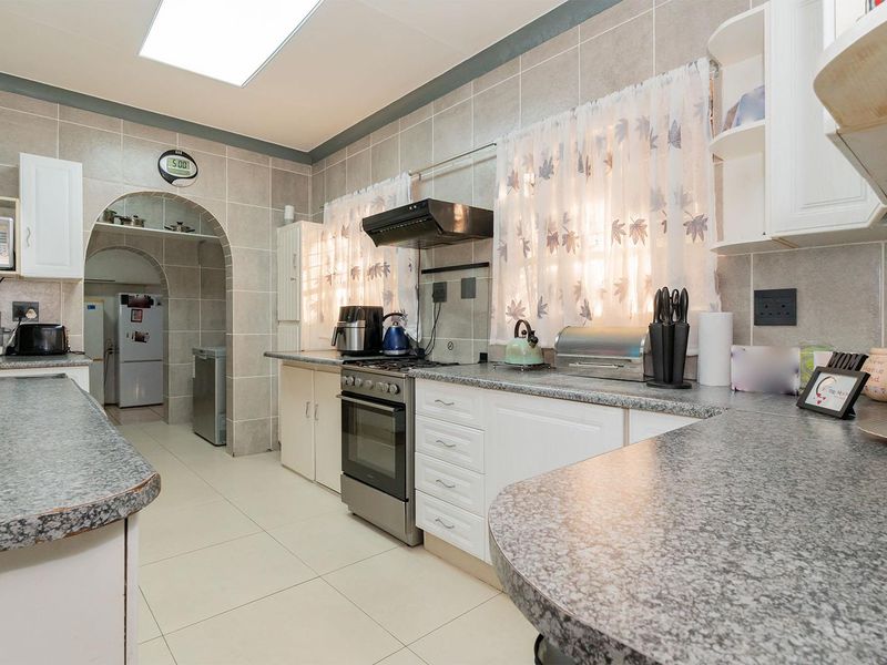 Spacious 3-Bedroom Family Home with Flatlet in Secure Boomed Area Birch Acres - Photo 7
