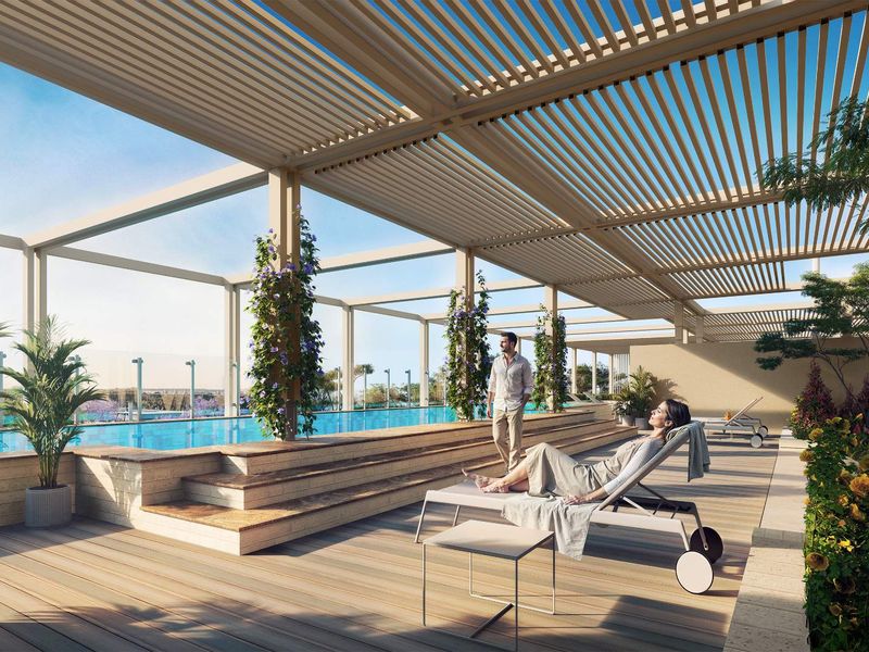 A luxurious penthouse pool area featuring a modern swimming pool, timber decking, and a stylish slatted pergola structure for shaded outdoor relaxation.