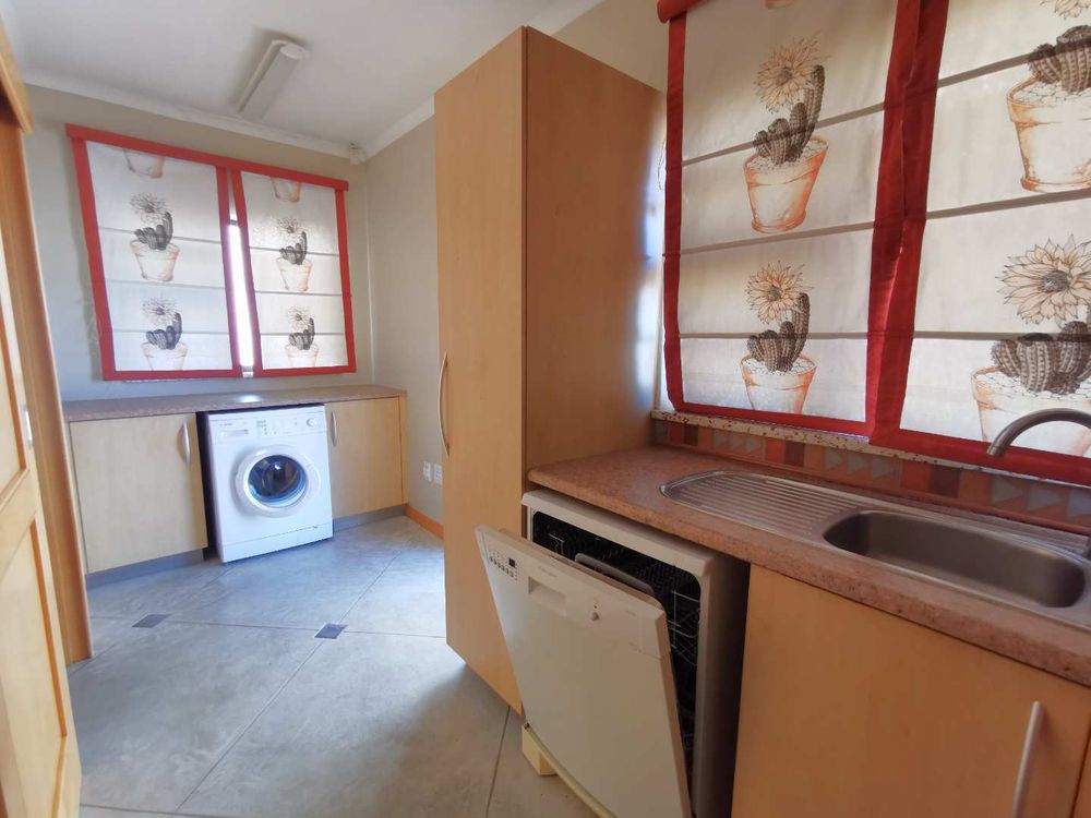 1ST FLOOR SCULLERY /LAUNDRY ROOM NEXT TO THE OPEN-PLAN KITCHEN 
