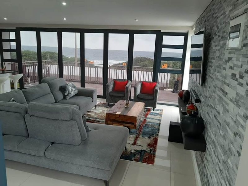 LUXURY BEACHFRONT LIVING | FULLY FURNISHED | OCEANFRONT GEM - Photo 1