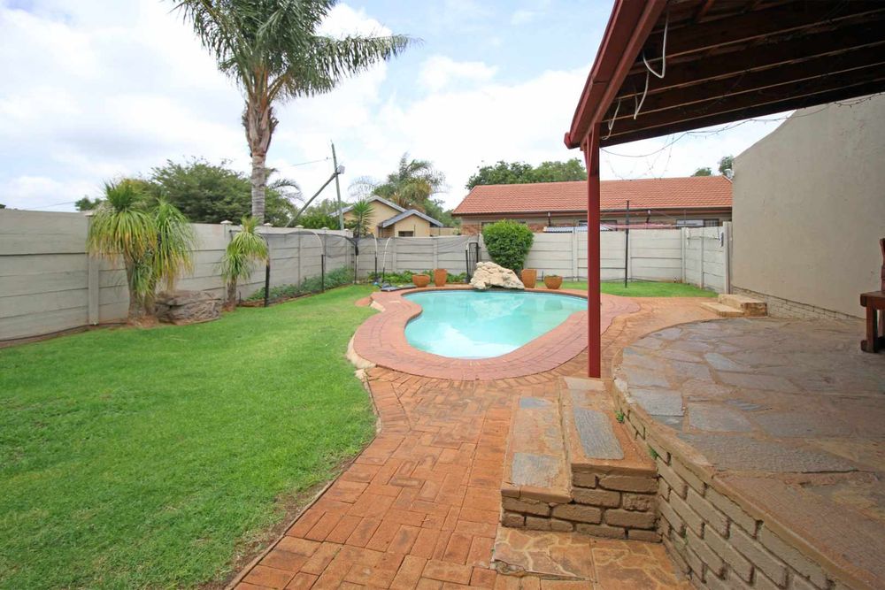swimming pool area with patio for entertainment