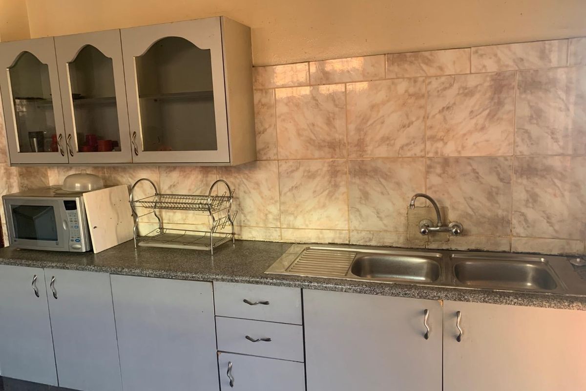 **Charming 3/4 Bedroom Family Home in Prime Location – A Must-See Investment Opportunity - Photo 3