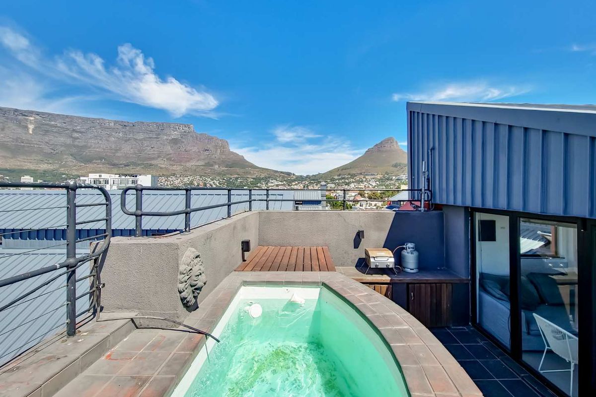 Entertain in Style: Spacious Penthouse with Pool & Views - Photo 2