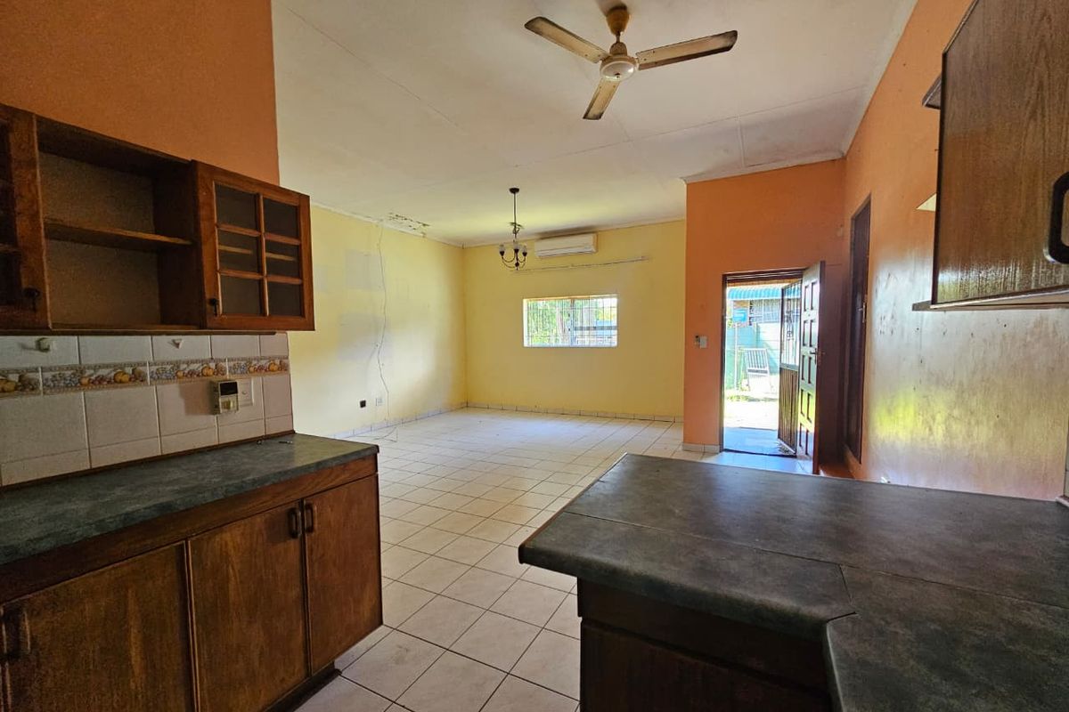 Bargain Fixer-Upper with Bonus Bachelor Flat – A Golden Opportunity! - Photo 3