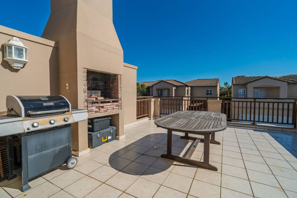 Second Floor outside entertainment area with built in braai