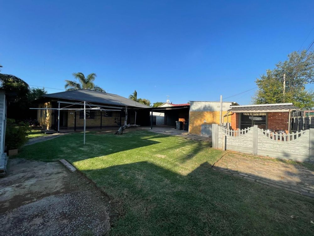 Back Yard - view of house and flat 