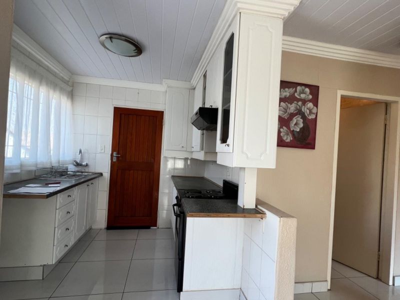 Cook, Relax, and Feel Safe in This Stunning 2-Bedroom Home - Photo 3