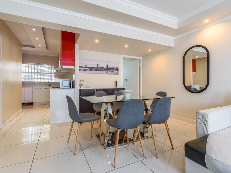BEACHFRONT LIVING WITH EXCEPTIONAL FLEXIBILITY ALONG THE MOUILLE POINT MILE - Photo 8