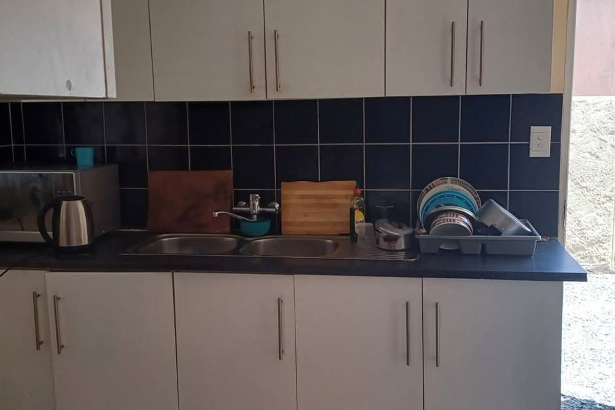 House is situated behind the Okahandja Mall. Additional to the main house is a 4 bedroom flat. - Photo 5