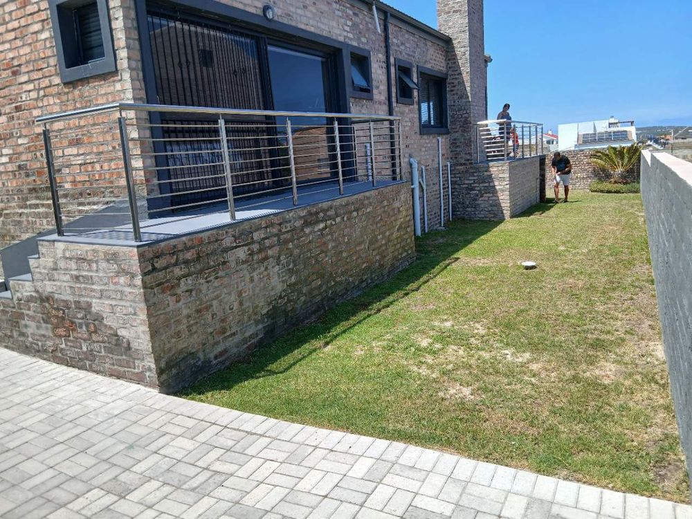 1 Side of the House - showing Main Bedroom's Balcony as well as Balcony on front. 