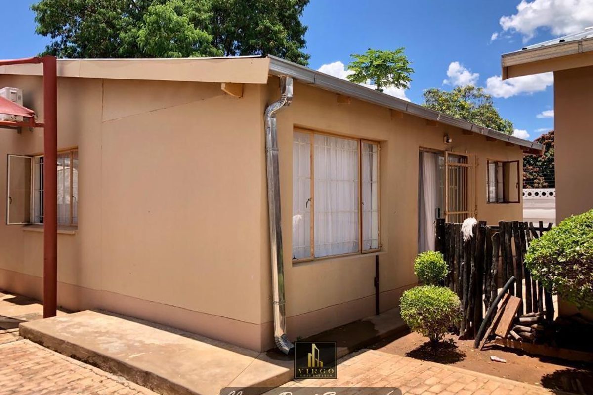 BEAUTIFUL & COZY 2 BEDROOM APARTMENT FOR SALE IN TSUMEB: KOMESHO COURT - Photo 2