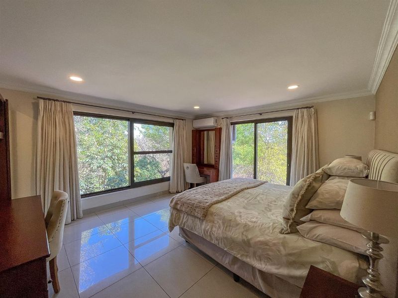 Elegant 5-Bedroom Home with Pool and Mountain Views - Photo 9